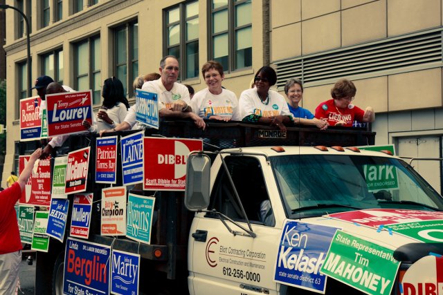 The DFL truck at Twin Cities Pride with Rep. Jeff Hayden, Rep. Bobby Joe Champion, Rep. Tim Mahoney, Rep. Alice Hausman, Rep. Rena Moran, Rep. Carolyn Laine, and Rep. Tina Liebling.